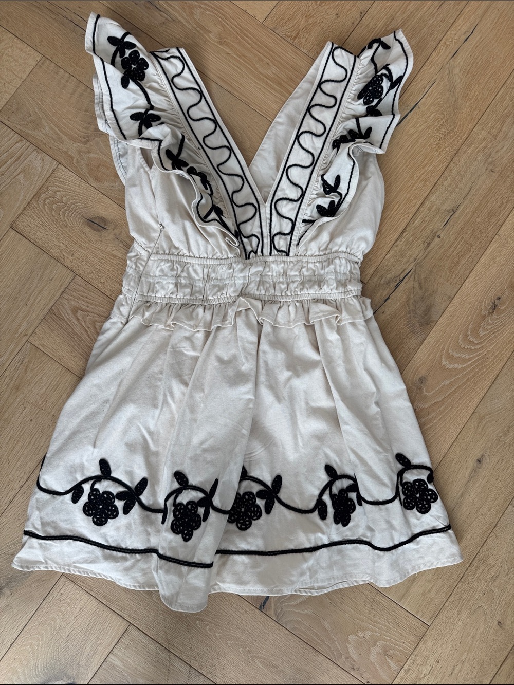 Embroidered White Mini Dress with Black Floral Trim